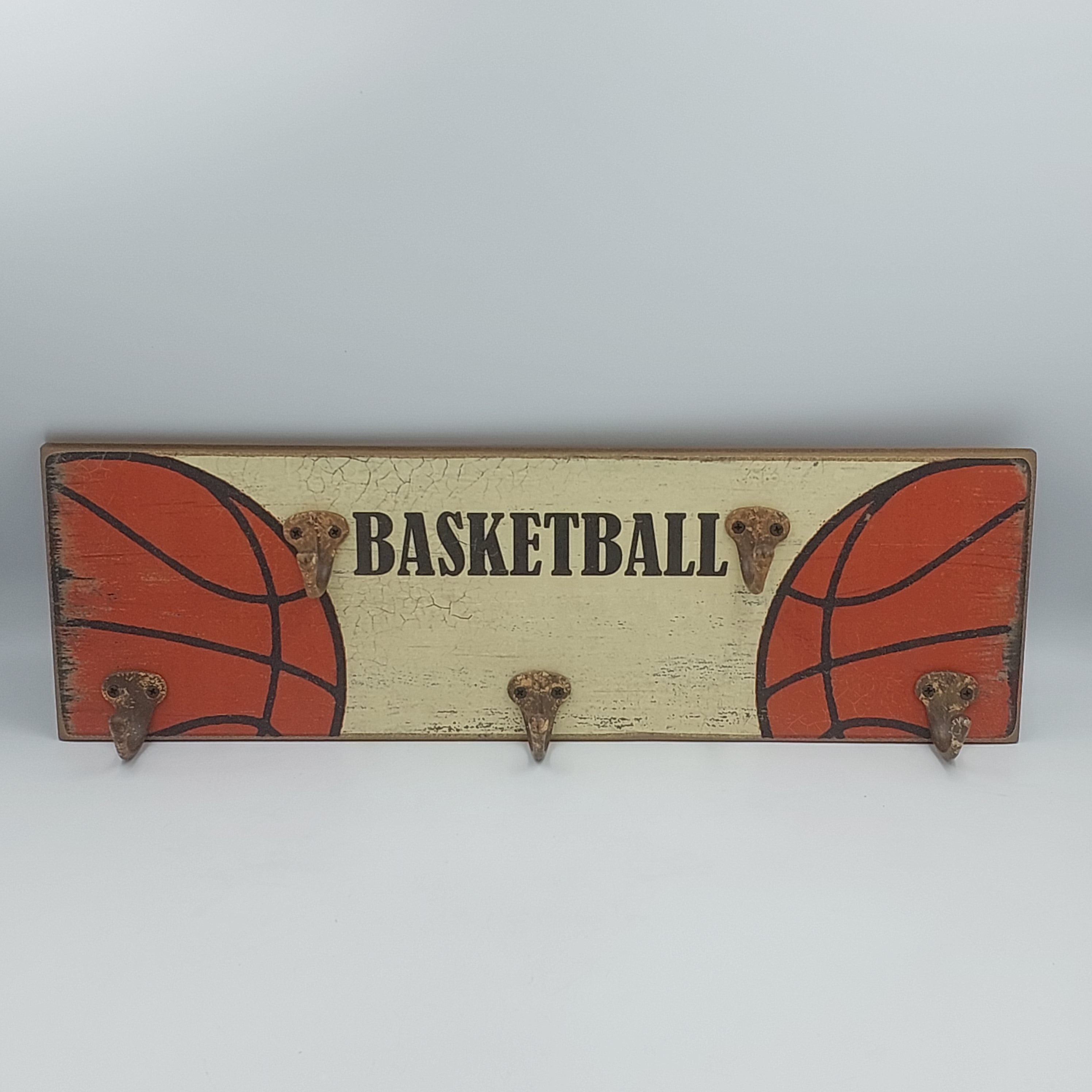 Basketball sign with coat hooks