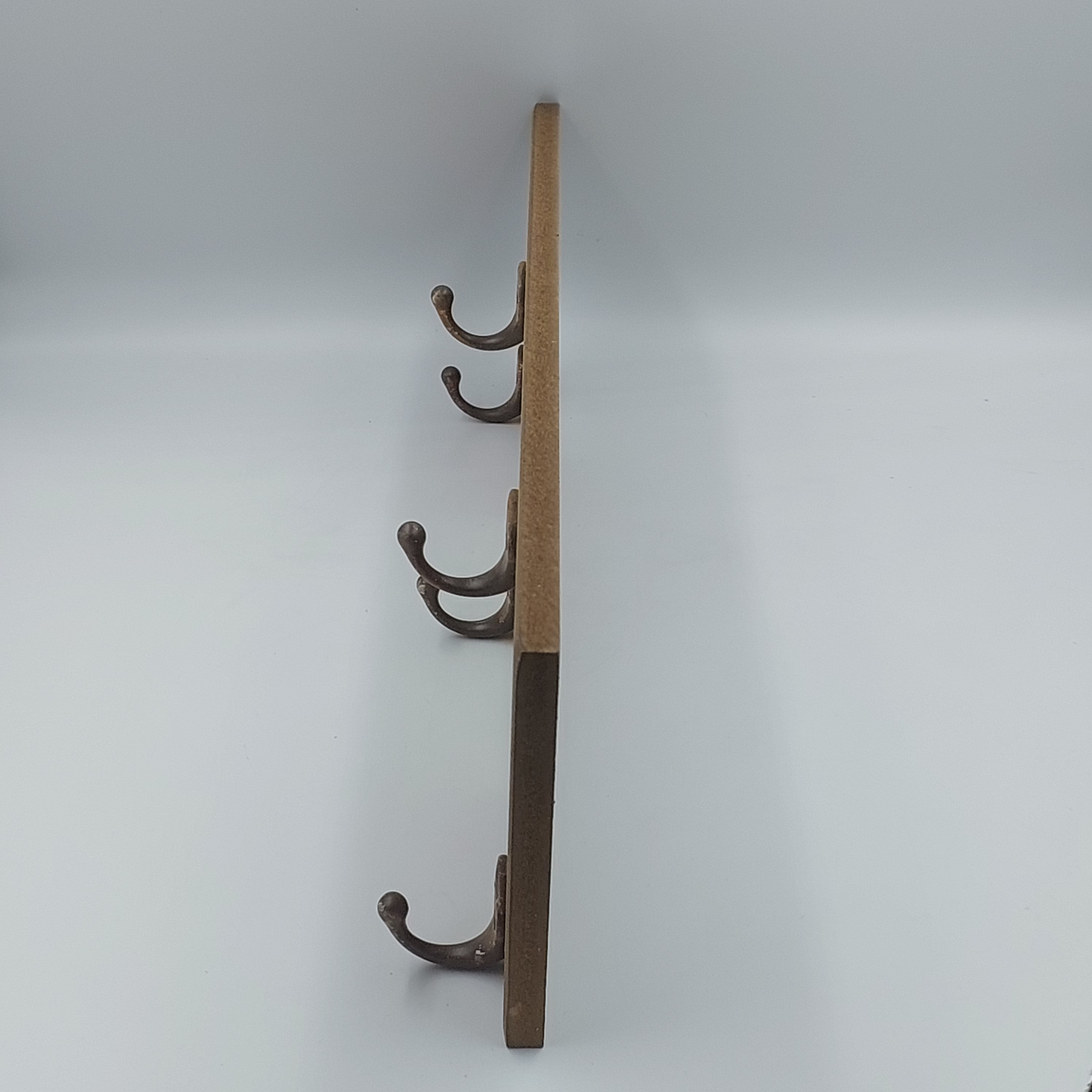 Basketball sign with coat hooks