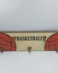 Basketball sign with coat hooks