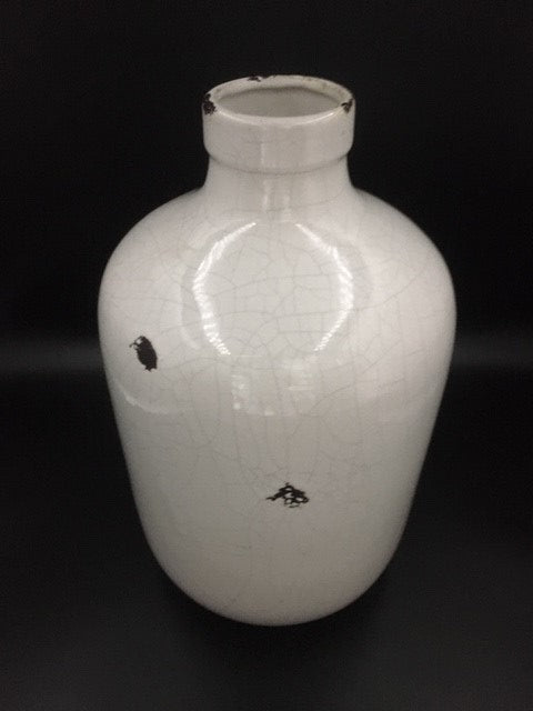 White aged vase